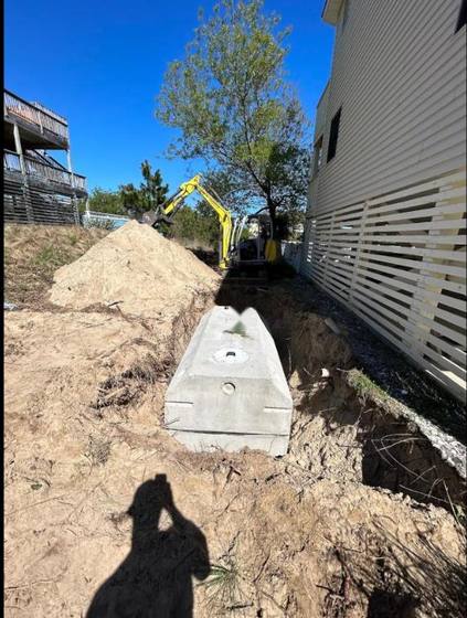 Concrete tank set in a side yard